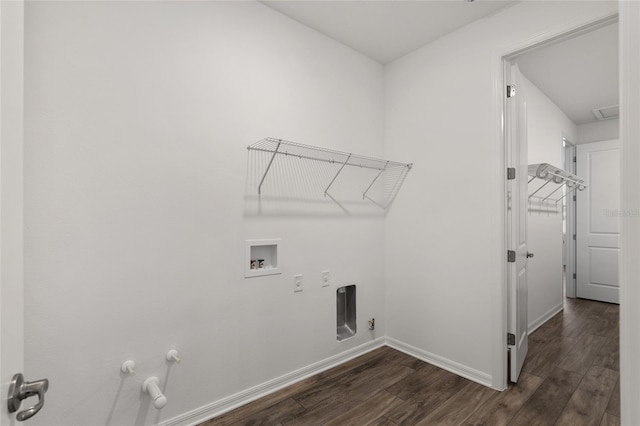 washroom with laundry area, baseboards, dark wood finished floors, hookup for a gas dryer, and hookup for a washing machine