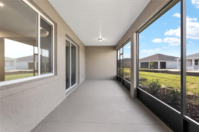 sunroom / solarium with a residential view