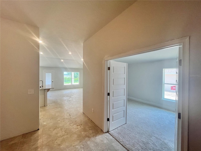 4381 SW 90th Pl, Ocala, FL 34476 - hallway with recessed lighting and baseboards