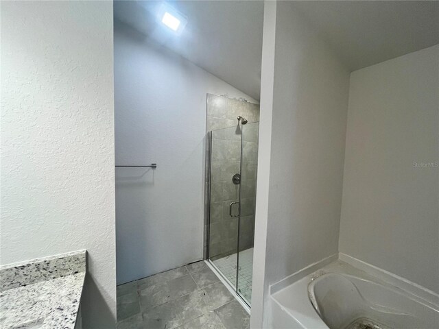 4381 SW 90th Pl, Ocala, FL 34476 - full bathroom featuring a shower stall and a bath