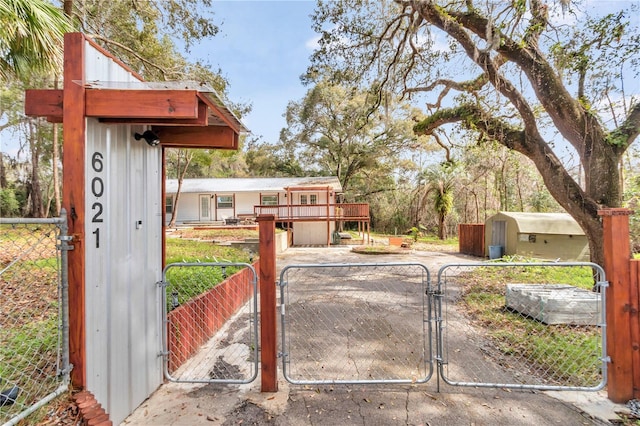 exterior space with fence and a wooden deck