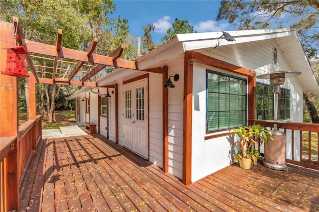 wooden terrace featuring a pergola