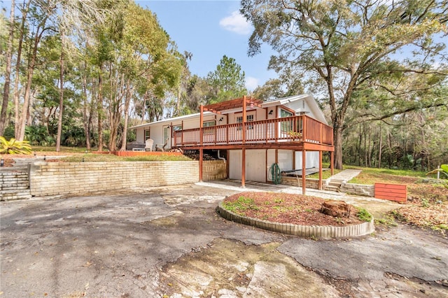 rear view of house with a deck