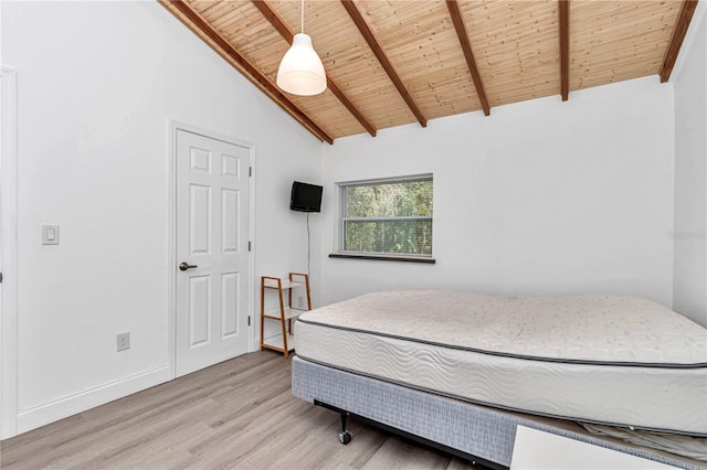 bedroom featuring high vaulted ceiling, wood finished floors, wood ceiling, baseboards, and beam ceiling