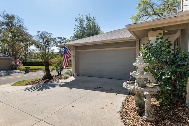 garage with driveway