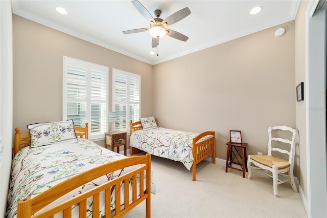 bedroom with recessed lighting, light carpet, a ceiling fan, baseboards, and crown molding