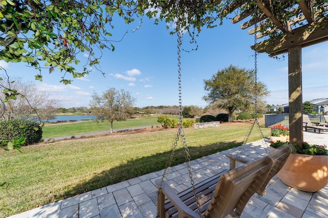 view of patio / terrace featuring a water view