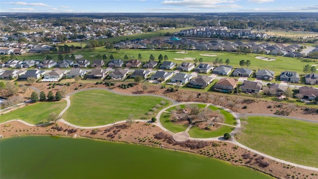 aerial view with a water view and a residential view