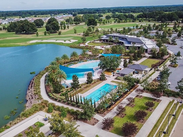 bird's eye view with view of golf course and a water view