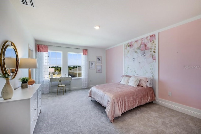 bedroom featuring ornamental molding, light colored carpet, visible vents, and baseboards