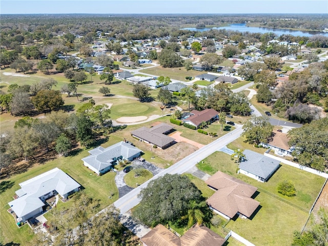 bird's eye view with a water view and a residential view