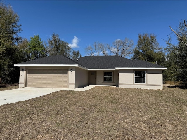 ranch-style house featuring a garage, a front yard, driveway, and stucco siding