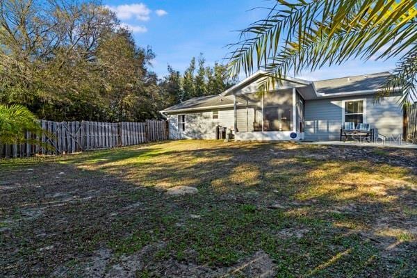 view of yard with fence