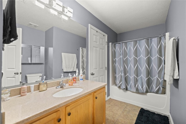 bathroom featuring visible vents, shower / bath combo with shower curtain, vanity, a textured ceiling, and tile patterned floors