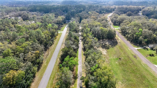 aerial view featuring a forest view