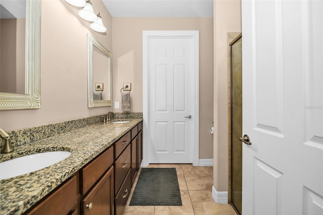 7234 SW 91st Ct, Ocala, FL 34481 - full bathroom featuring double vanity, a tile shower, and tile patterned flooring