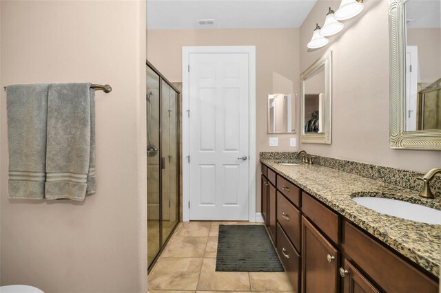 7234 SW 91st Ct, Ocala, FL 34481 - bathroom with double vanity, a stall shower, and tile patterned flooring