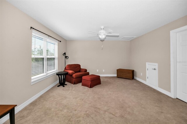 7234 SW 91st Ct, Ocala, FL 34481 - sitting room with carpet flooring, baseboards, and a ceiling fan