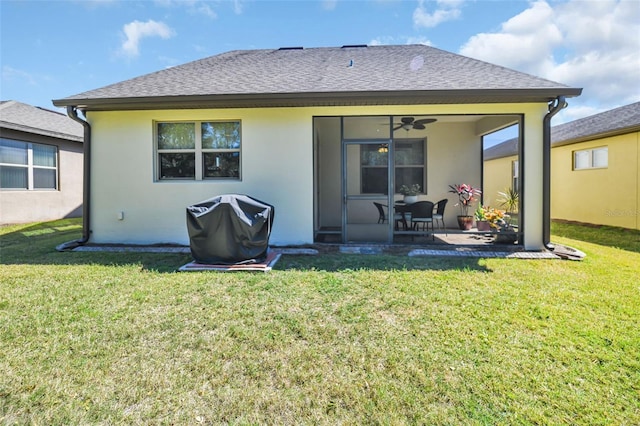 7234 SW 91st Ct, Ocala, FL 34481 - back of house with ceiling fan, a lawn, a patio area, and stucco siding