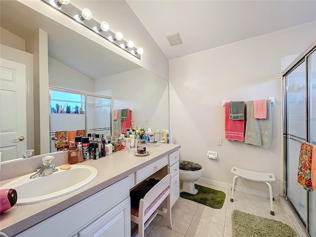 bathroom with lofted ceiling, visible vents, toilet, a stall shower, and tile patterned flooring