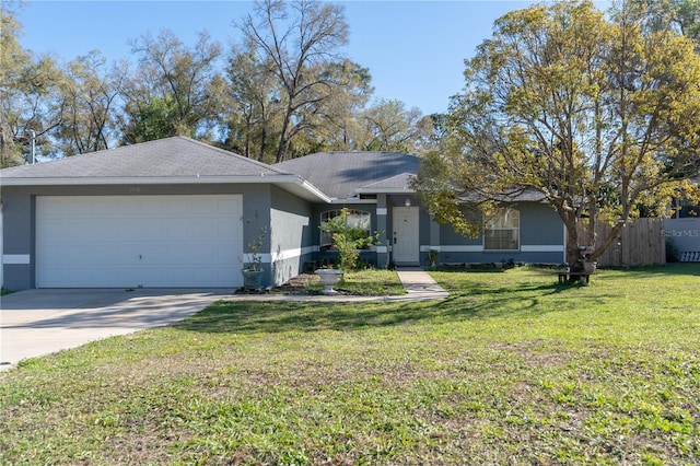 single story home featuring stucco siding, driveway, a front lawn, fence, and a garage