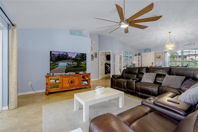 living area featuring light tile patterned floors, baseboards, lofted ceiling, and ceiling fan with notable chandelier