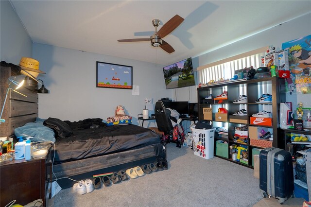 carpeted bedroom with ceiling fan