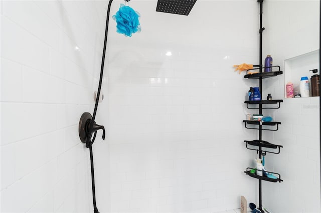 room details with a tile shower