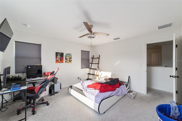 bedroom with ceiling fan, carpet, visible vents, and baseboards