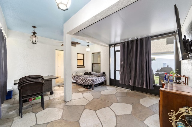 bedroom with stone tile flooring