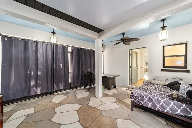 bedroom featuring beamed ceiling