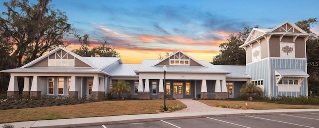 view of property featuring uncovered parking