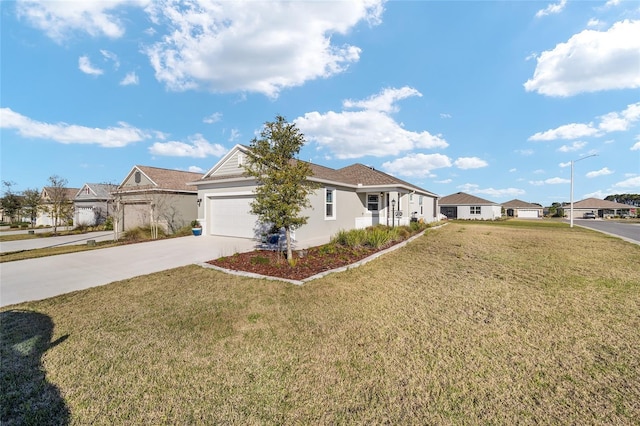 single story home featuring driveway, a garage, a residential view, a front lawn, and stucco siding