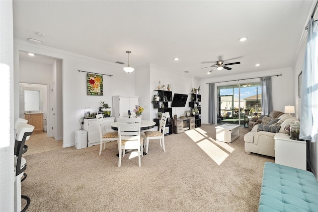 dining room with recessed lighting, visible vents, ornamental molding, light carpet, and baseboards