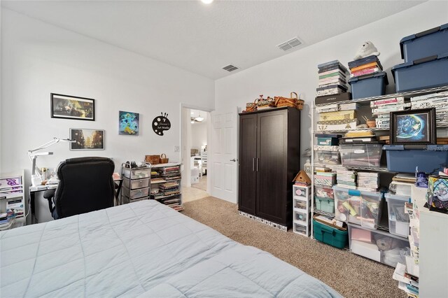 bedroom with carpet and visible vents