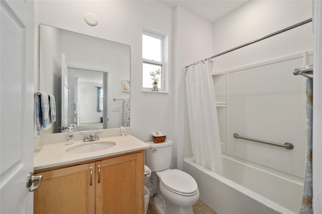 full bathroom with shower / tub combo with curtain, vanity, and toilet