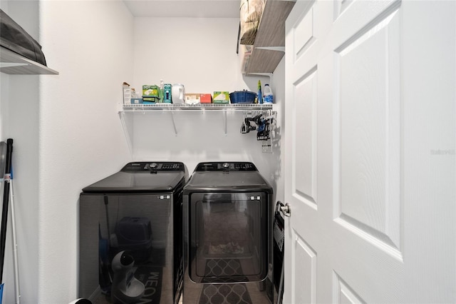 laundry room with laundry area and separate washer and dryer