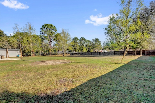 view of yard featuring fence