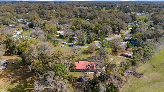 aerial view with a wooded view