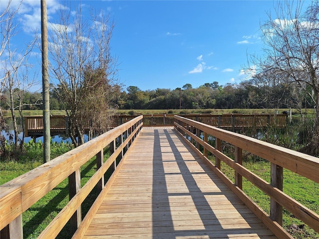 view of dock with a water view