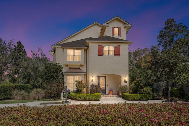 view of front of home with stucco siding