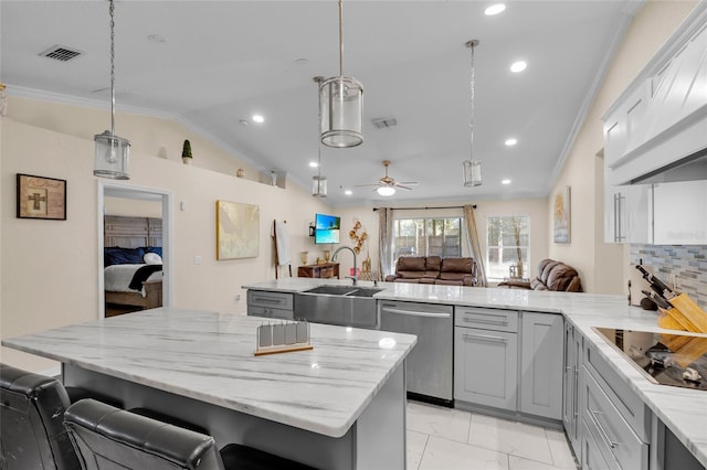 kitchen featuring gray cabinets, visible vents, stainless steel dishwasher, a sink, and black electric cooktop