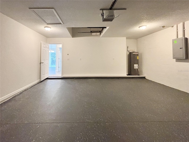 garage with concrete block wall, electric panel, baseboards, a garage door opener, and water heater