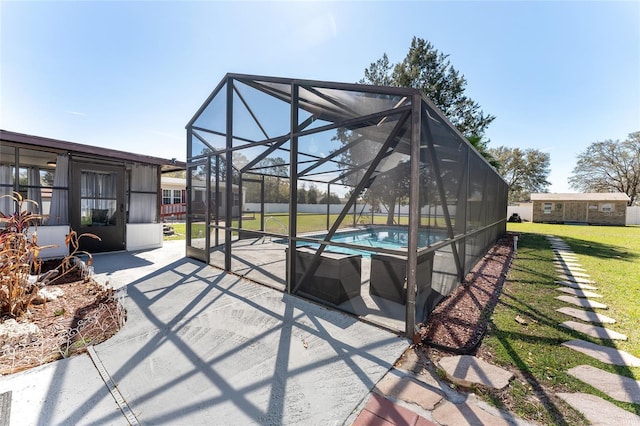 view of patio with a fenced in pool and glass enclosure