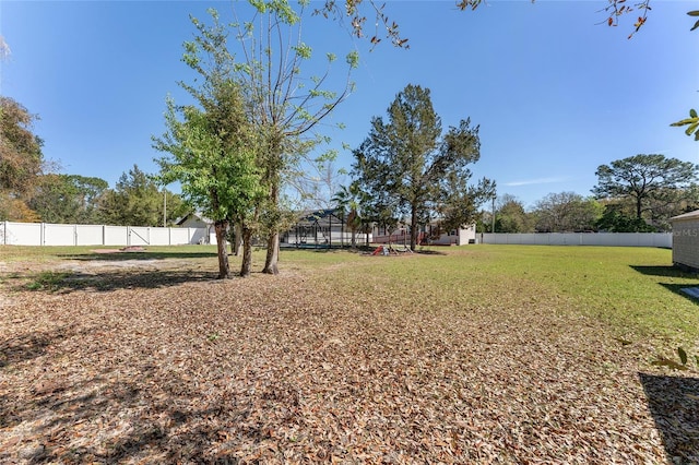 view of yard with a fenced backyard