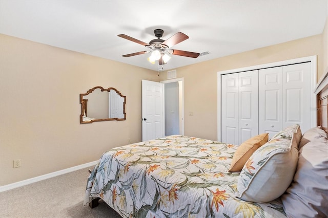 bedroom with carpet, a closet, visible vents, ceiling fan, and baseboards