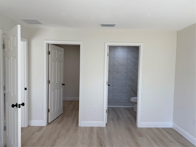 31 Juniper Pass Ln, Ocala, FL 34480 - unfurnished bedroom with light wood-style floors and baseboards