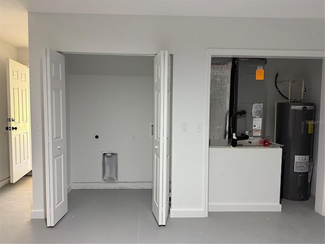 31 Juniper Pass Ln, Ocala, FL 34480 - interior space featuring electric water heater and concrete flooring