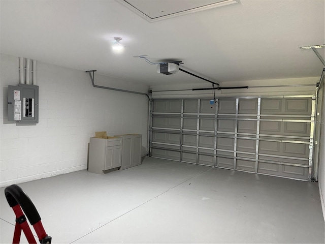 31 Juniper Pass Ln, Ocala, FL 34480 - garage featuring electric panel, a garage door opener, and concrete block wall