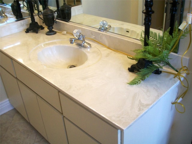 bathroom featuring tile patterned floors and vanity